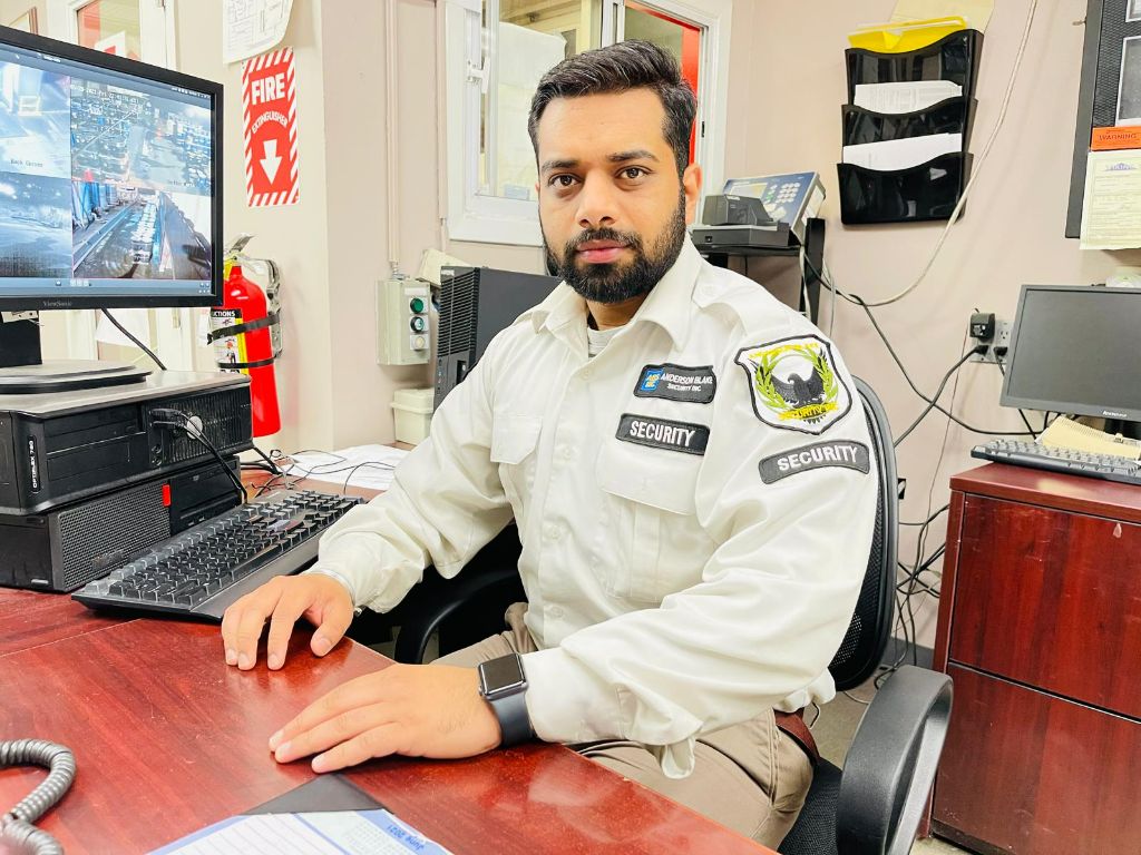 Operator at security control room workstation