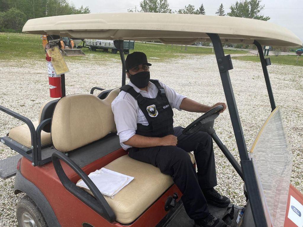 Security officer on golf cart patrol
